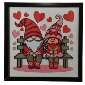 Tableau décoratif en papier multicouches représentant deux gnomes de Saint‑Valentin, fabriqué en atelier à Genève
