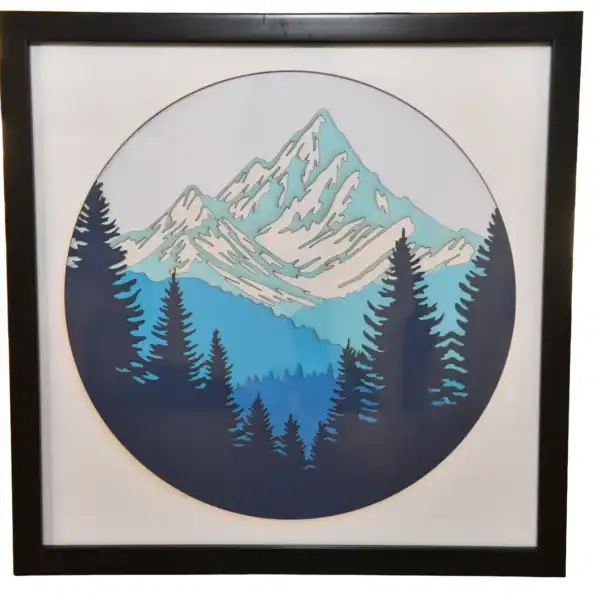 Tableau décoratif en papier multicouches représentant un paysage de montagne enneigée, fabriqué en atelier à Genève