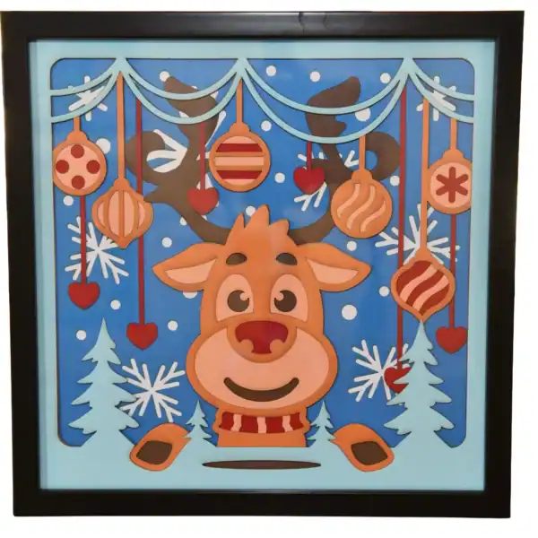 Tableau décoratif en papier multicouches représentant un renne de Noël avec motifs festifs, fabriqué en atelier à Genève