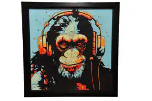 Tableau décoratif en papier multicouches représentant un singe DJ stylisé avec casque audio, fabriqué en atelier à Genève