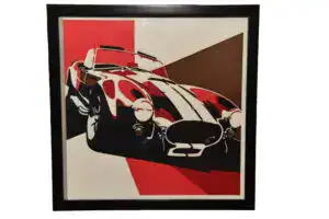 Tableau décoratif en papier multicouches représentant la Shelby Cobra stylisée, fabriqué en atelier à Genève